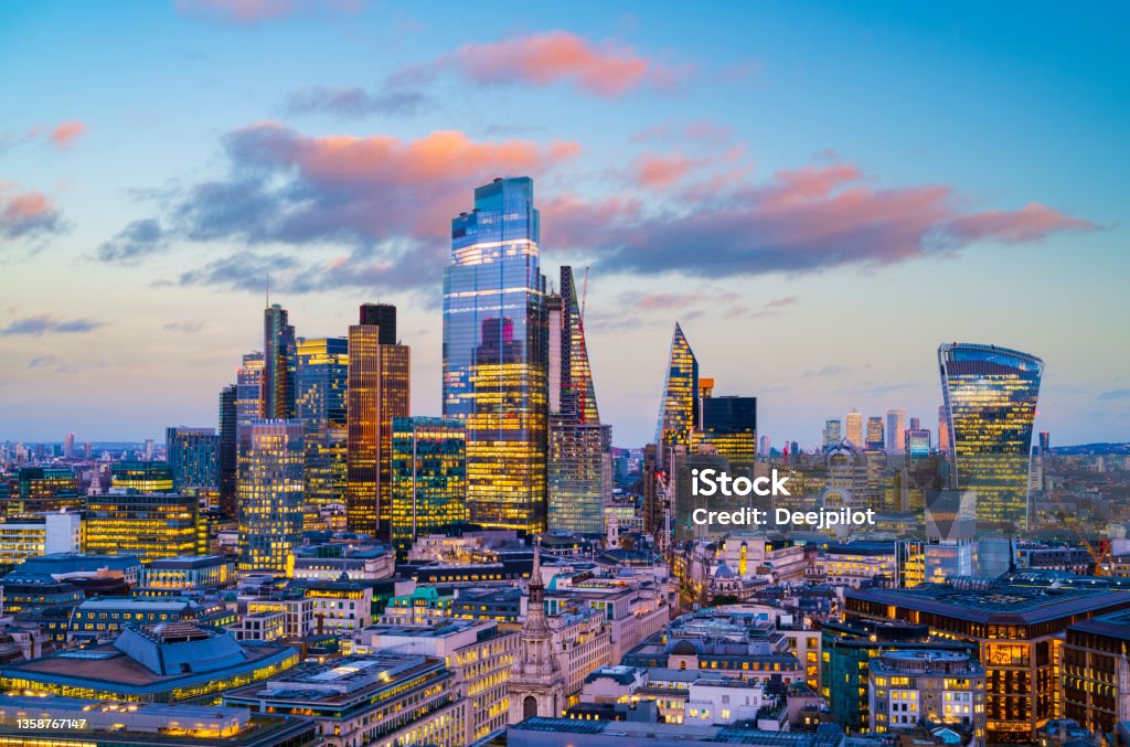 City of London Business District at Sunset, London, UK Last of the Sunset Light Falling onto the Buildings, sky copy space London - England Stock Photo