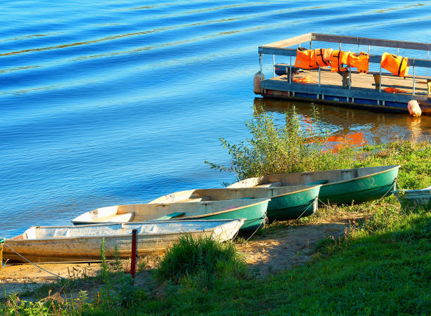 istock Boat on the river beach background 1358771919