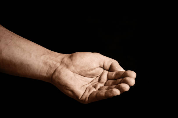 istock Hands begging for help. Empty hand isolated. Charity symbol gesture background. Man asking for money. 1358779215