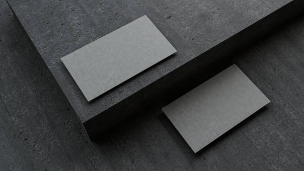 istock Business cards blank mockup on dark concrete floor 3d illustration 1358779737
