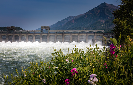 An aerial drone photograph of a hydro electric dam in the Scottish Highlands. Scotland's hydro power supplies 85% of the UK's hydro electric power, providing a valuable renewable resource, as part of the country's aim to produce more sustainable energy.