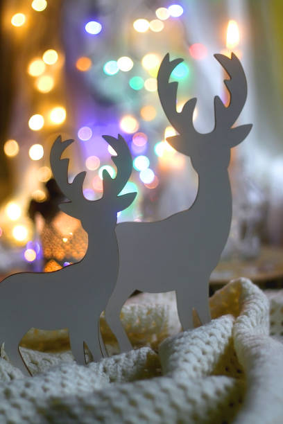 istock Reindeer Decorations and Colorful Bokeh 1358785151