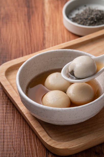 istock Sesame big tangyuan with syrup soup. 1358785548