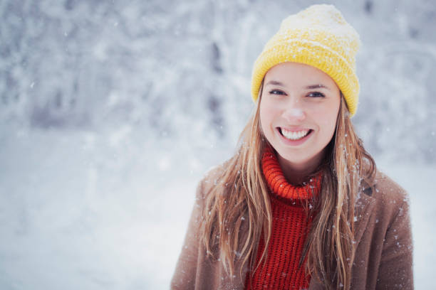 istock Young woman enjoys in winter 1358785669