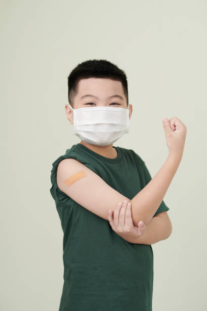 istock Boy Happy to Get Vaccine Shot 1358786010