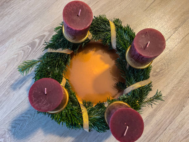 istock An Advent wreath on a wooden floor. 1358788446