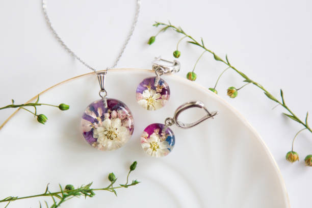 istock Real flowers in epoxy resin, jewelry 1358789245