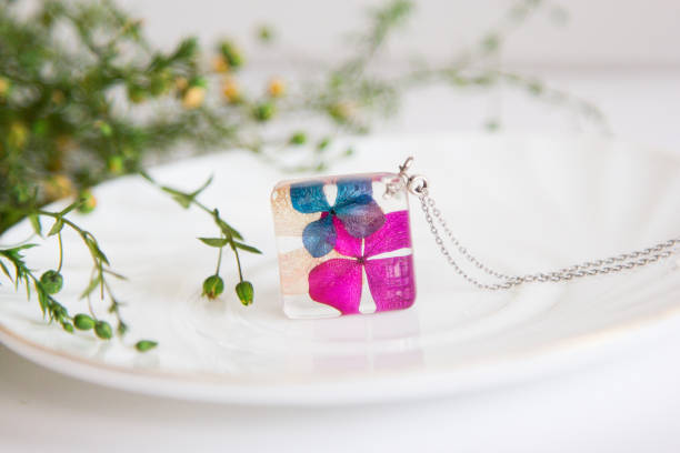 istock Real flowers in epoxy resin, jewelry 1358789314