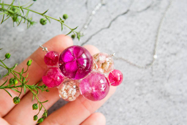 istock Real flowers in epoxy resin, jewelry 1358789408