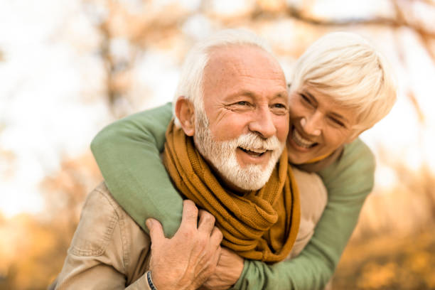 istock Blessed senior couple enjoying an autumn day together. 1358790021