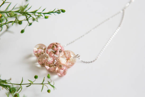 istock Real flowers in epoxy resin, jewelry 1358790028