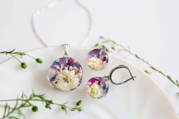 istock Real flowers in epoxy resin, jewelry 1358791963