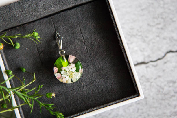 istock Real flowers in epoxy resin, jewelry 1358793586