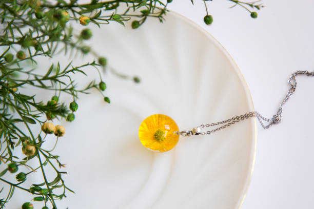 istock Real flowers in epoxy resin, jewelry 1358793711