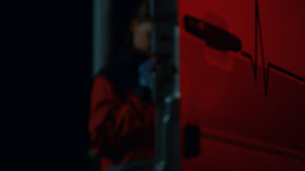 emergency lights flashing on ambulance car at night. car with open door - vehicle door flash imagens e fotografias de stock