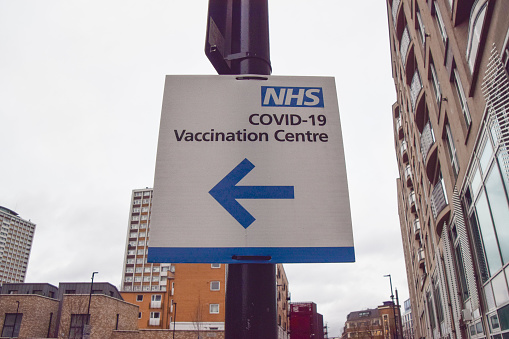 London, UK - December 13 2021. An NHS COVID-19 vaccination centre sign in Islington.
