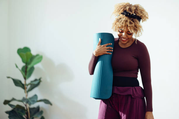 istock Afro-American Woman Preparing for a Yoga Training 1358796239