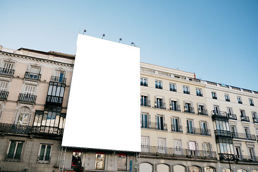 Large blank billboard on building facades