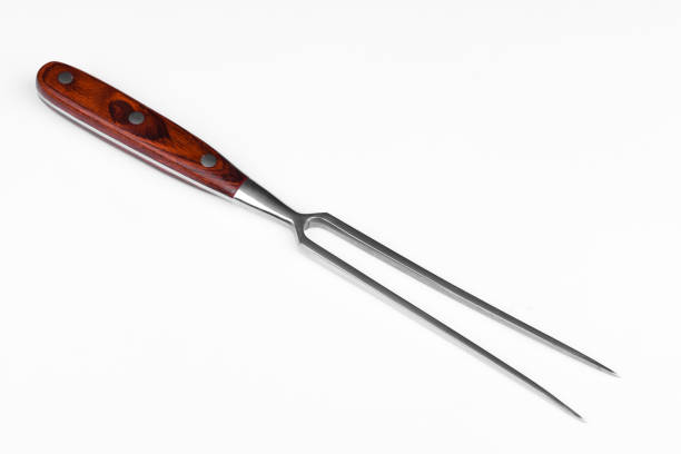 Close up of BBQ grill brush. Isolated on a white background.