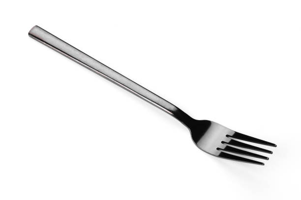 istock Beautiful dining fork isolated on a white background 1358798684