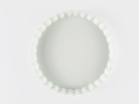 White tea cup on white background (Kung Fu tea cup to judge the color of tea)