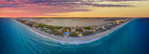 istock Large panorama Cancun beach strip during sunset 1358800583