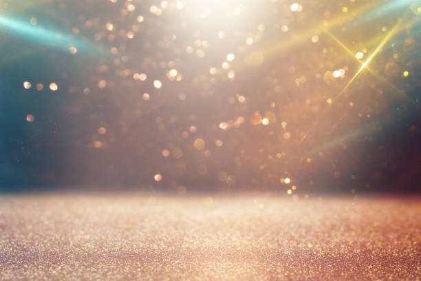 istock background of abstract gold and silver glitter lights. defocused 1358803785