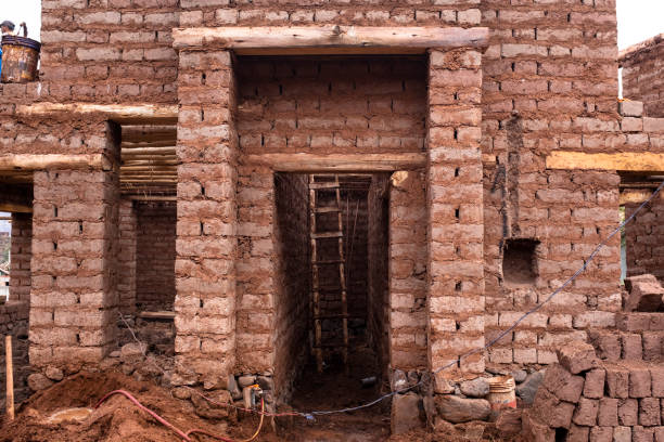 House made of adobe mud in rural countryside in Cusco Peru. Traditional house from the Peruvian Andes.