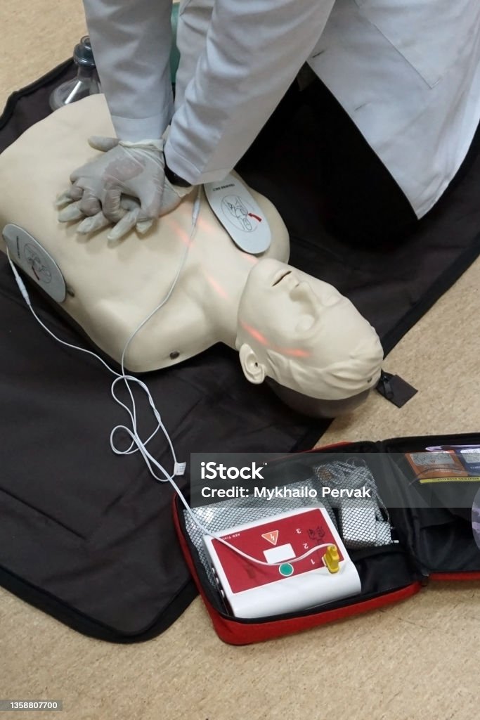 Chest Compressions On A Simulation Dummy During Basic Life Support With ...