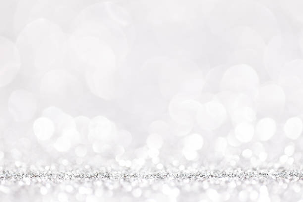 istock sparkles of Silver glitter abstract background. Copy space 1358807705