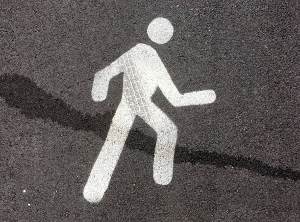 istock Pedestrian street sign on asphalt floor 1358809413