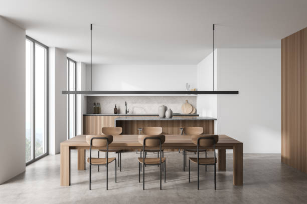 istock White and wood dining room with linear light and kitchen on background 1358809746
