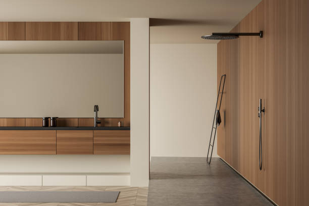istock Bright bathroom interior with shower, mirror, sink, carpet and towels 1358809849