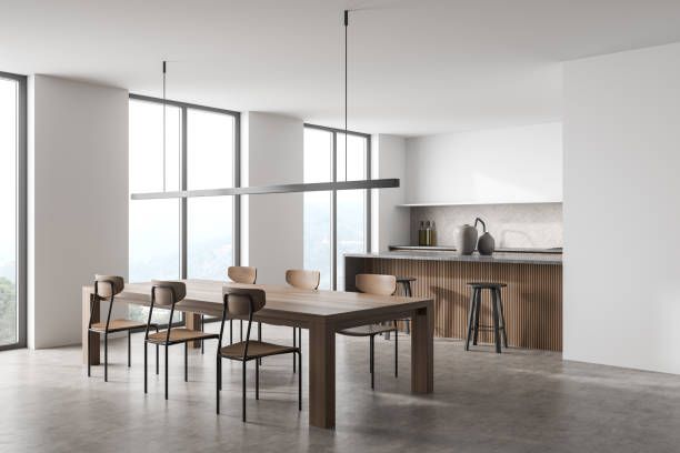 istock Minimalist white and wood kitchen with linear light. Corner view. 1358810760