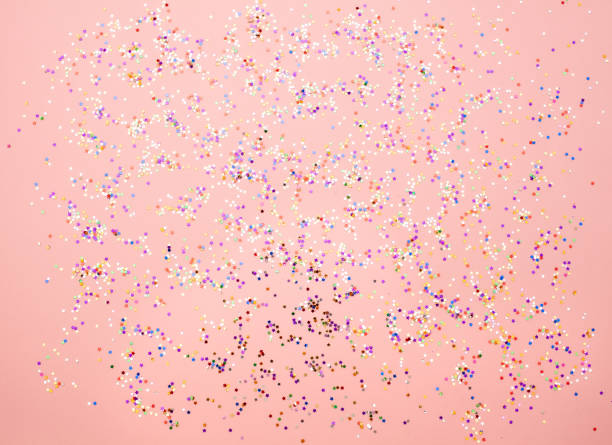 istock Holiday background with colored confetti 1358810789