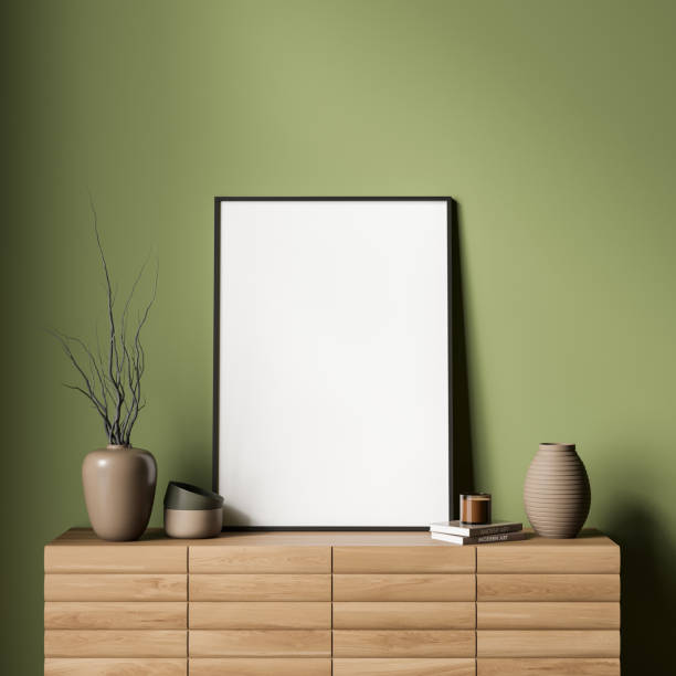 istock Green living room wall with canvas standing on wood sideboard 1358810954