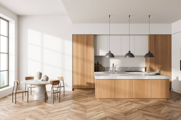 istock White kitchen interior with eating table and chairs on parquet floor 1358811045