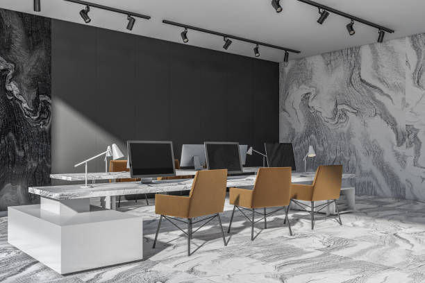 istock Grey and white marble office with leather armchairs. Corner view. 1358811064