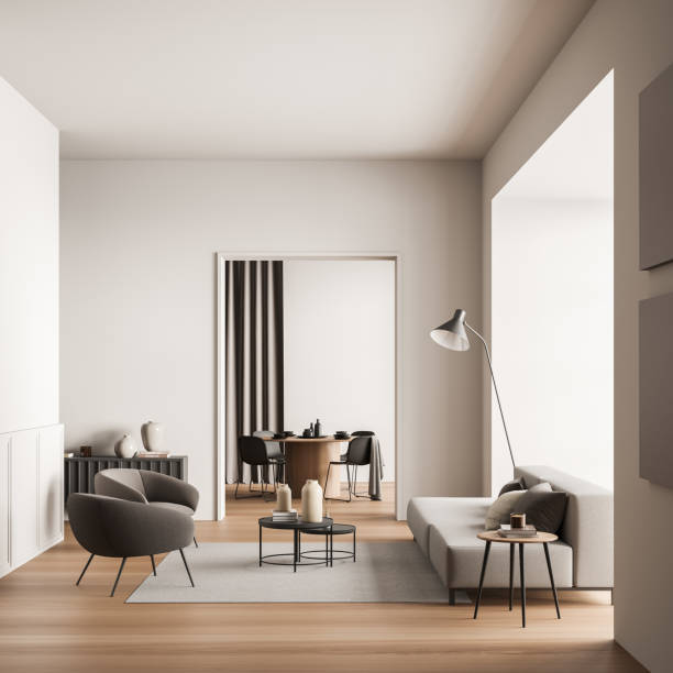 istock Beige living room with dining table on background. Seating arrangement idea. 1358812109
