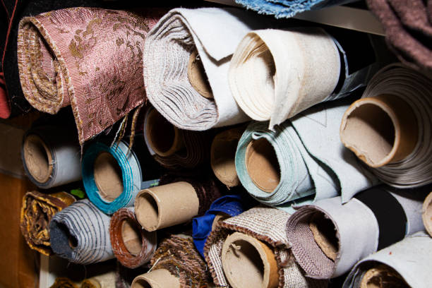 istock there are different rolls of fabric and leatherette on the shelf. 1358823181
