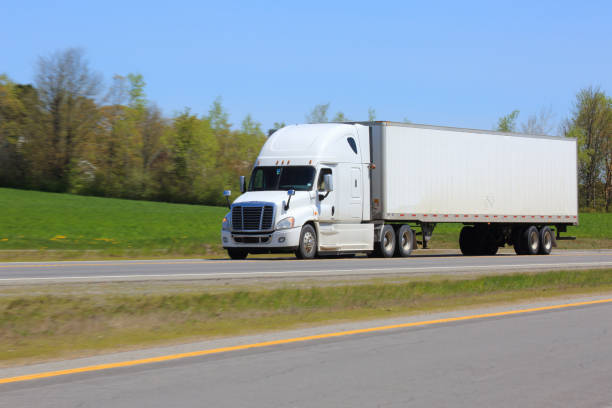 istock Semi-truck on highway 1358826535