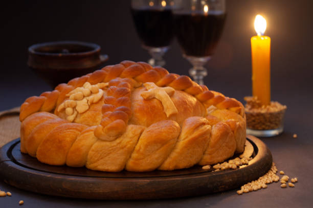 Serbian slava cake with wine and candle stock photo