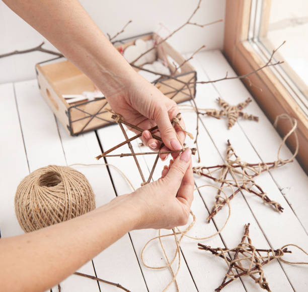 istock Christmas stars from branches and jute rope, Make stars with your own hands. Master Class. 1358831814