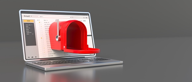 Red retro mailbox open empty with raised flag out of a laptop screen, grey background. Email inbox. New e mail incoming in the office. 3d illustration