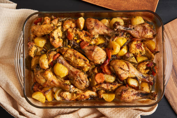 istock Grilled chicken drumsticks with potatoes 1358841215