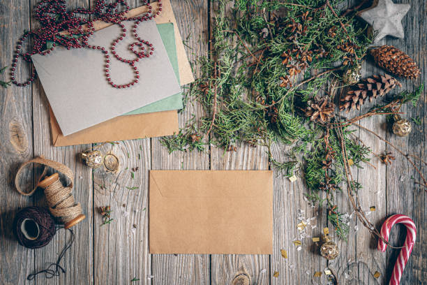 istock Flat lay Christmas composition with letters on a wooden surface. 1358845514