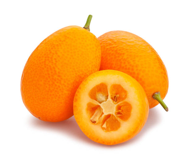 kumquat sliced kumquat path isolated on white kumquat stock pictures, royalty-free photos & images