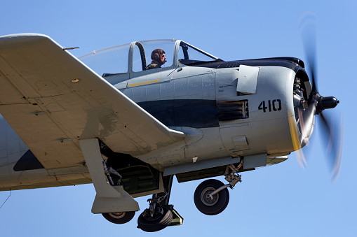 Tyabb, Australia - March 9, 2014: North American Aviation T-28D Trojan aircraft VH-CIA takes off from Tyabb Airport.