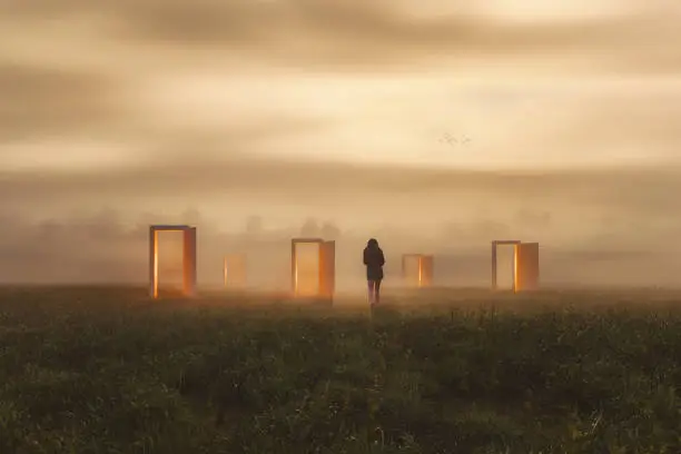 Photo of Surreal abstract doors with woman leaving in fantasy landscape