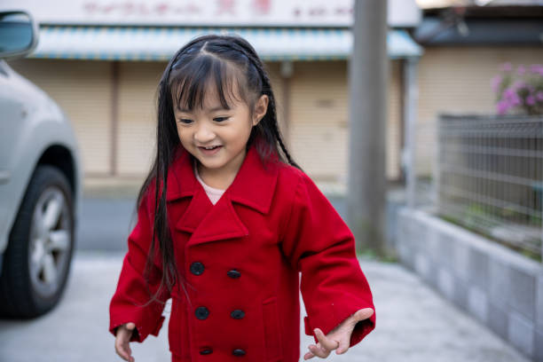 A portrait of a small cute elementary age school girl.